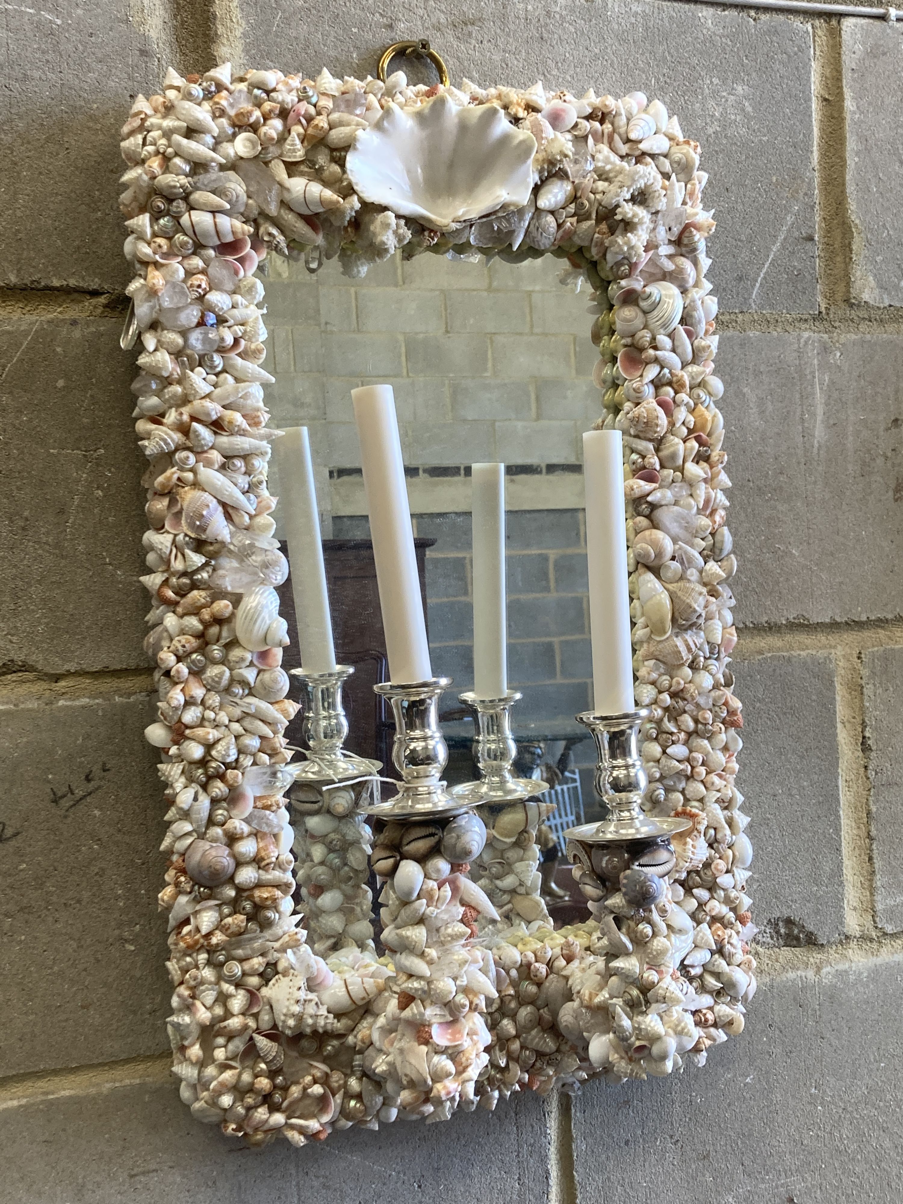 A pair of contemporary shell encrusted two-branch electric girandoles, width 39cm, height 64cm
